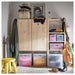 A labeled IKEA storage box with lid - keep your belongings sorted and easy to find.