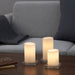 "Create a cozy indoor ambiance with IKEA's white LED block candles, set of 3.40520452     

