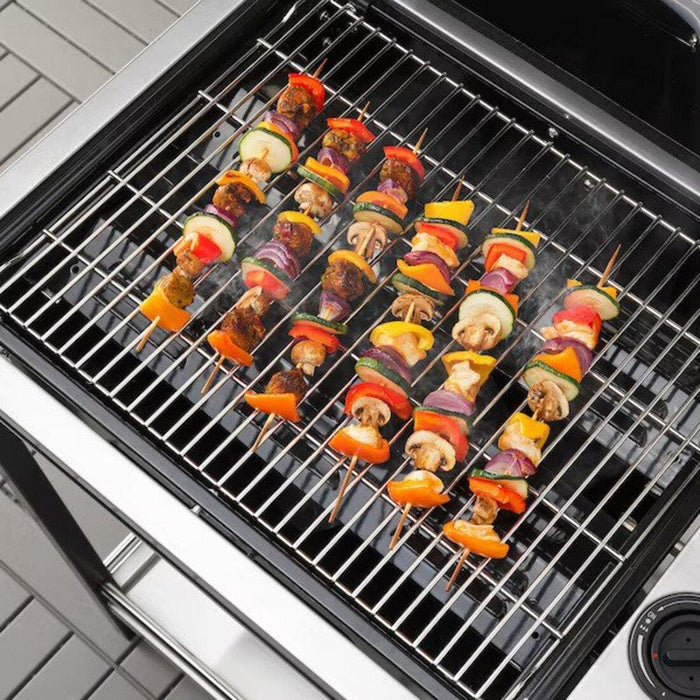 Colorful vegetable skewers on a grill