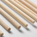 Set of wooden sticks on a light gray background