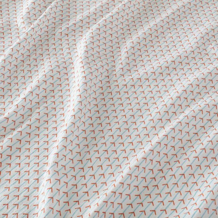Close-up of white and orange IKEA curtains, showing the fabric texture  00532305