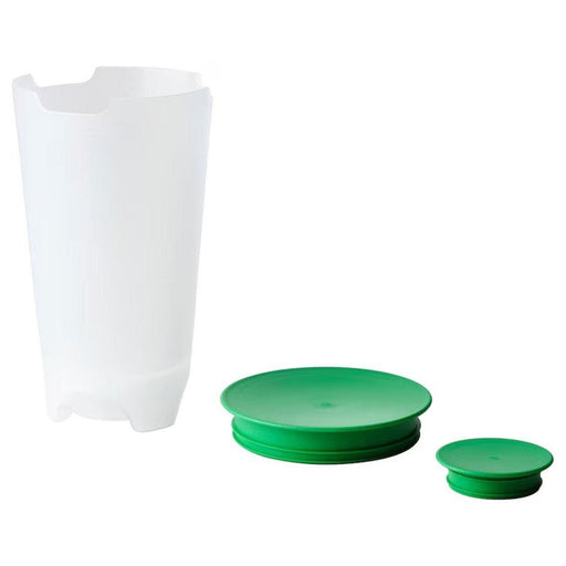 Salad Shaker with Greens: "Fresh and crisp salad ingredients inside a salad shaker with a strainer