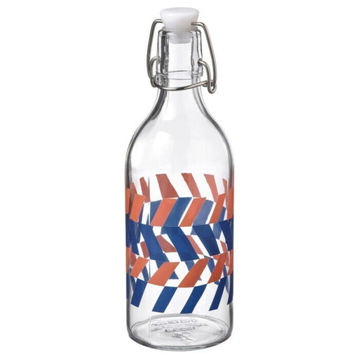 Versatile clear glass bottle with a stopper, ideal for preserving liquids, available at IKEA.