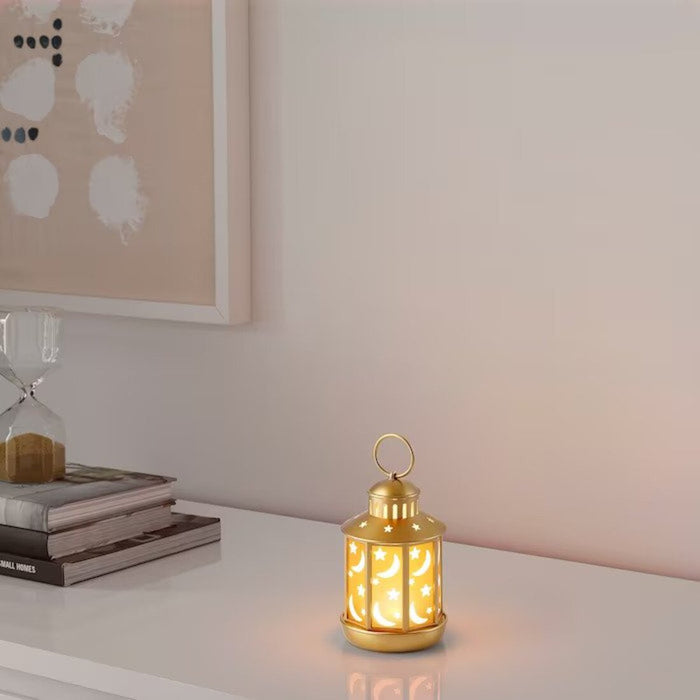 Brass-colored battery-operated LED lantern by IKEA, perfect for indoor lighting  60543122