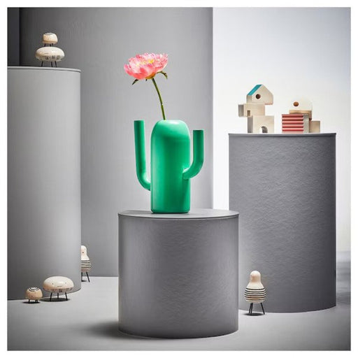 IKEA Vase/Watering Can holding a vibrant bouquet of fresh flowers, enhancing home interior decor.
