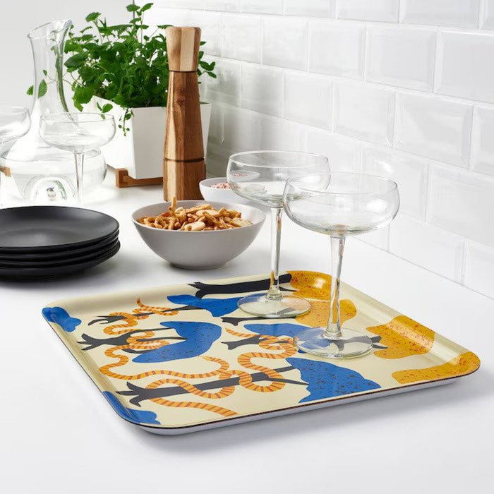 A functional and trendy storage tray featuring an eye-catching pattern in various colors.