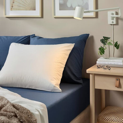 Experience the smooth texture and deep blue hue of the IKEA ULLVIDE fitted sheet   90342725