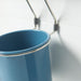 Blue IKEA HULTARP Container with nickel-plated rim, 14x16 cm (5 1/2x6 1/4 inches), hanging from two metal hooks on a wall, demonstrating a stylish and practical storage solution-60588714