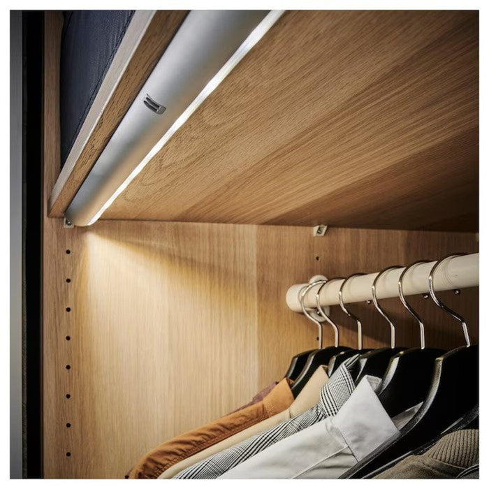 LED lighting strip installed in bedroom cabinet  for creating a cozy and relaxing atmosphere