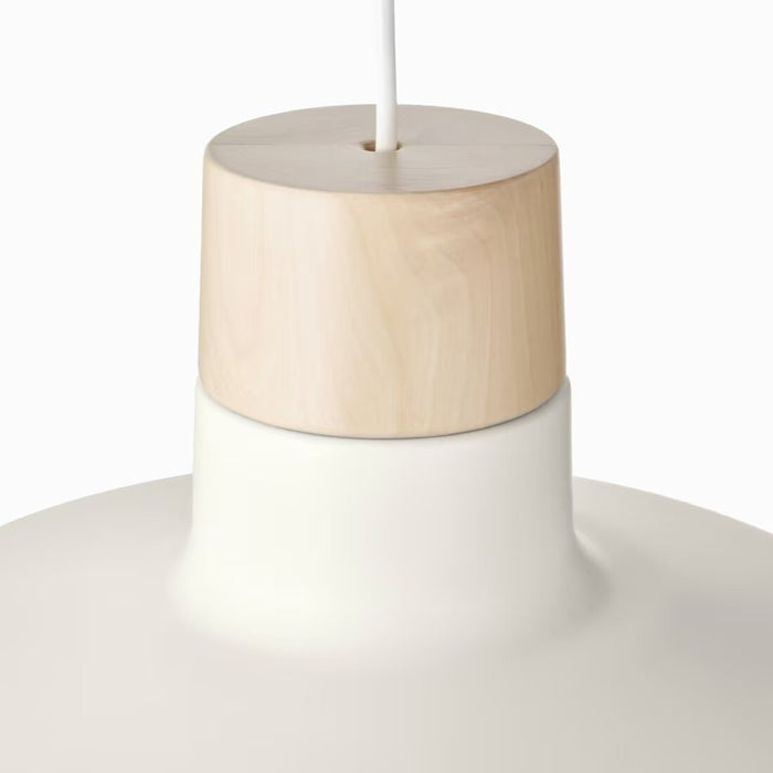 "Close-up view of a pendant lamp featuring a cylindrical wooden element at the top, seamlessly transitioning into a smooth, rounded white shade. The minimalist design highlights the blend of natural wood and modern white materials, creating an elegant and contemporary aesthetic-90488398