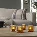 Create a cozy atmosphere with this elegant tealight holder from IKEA. Its sleek and minimalist design will make it a perfect addition to any décor-80548227