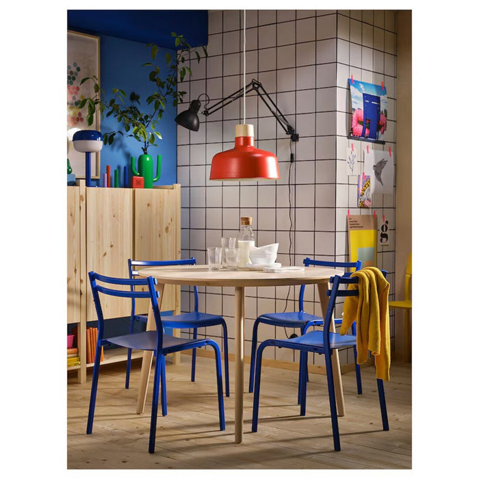 IKEA BUNKEFLO 14-inch red and birch wood pendant lamp hanging over a dining table – modern Nordic-style lighting