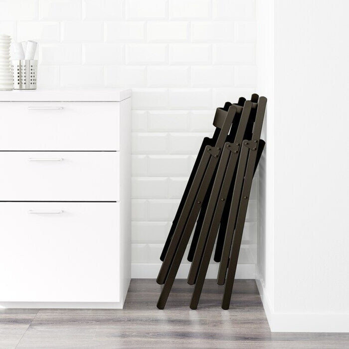 Digital Shoppy Compact TERJE folding chair, designed for easy storage and convenience.