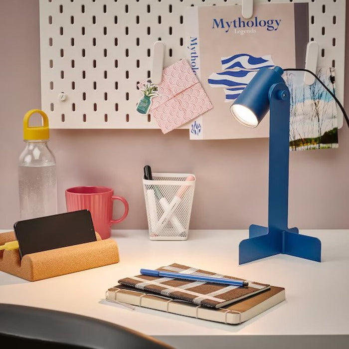 The FLOTTILJ Desk Lamp illuminating a workspace with its bright LED light 40549766