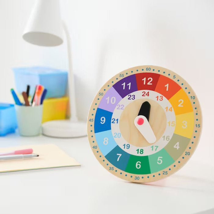 Close-up of multicolored 25 cm educational wooden clock-10515188