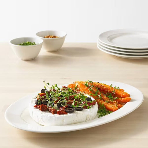 Elevate your dining experience with the sleek design of IKEA VARDAGEN Serving Plate.