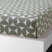 Soft cotton weave detail of IKEA ÄNGSNEJLIKA sheet set in muted grey-green tones 90576286