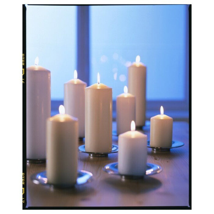 Image of Burning IKEA Unscented Pillar Candles, Natural, 23 cm (9") ndle, Natural, 23 cm (9")  30528420