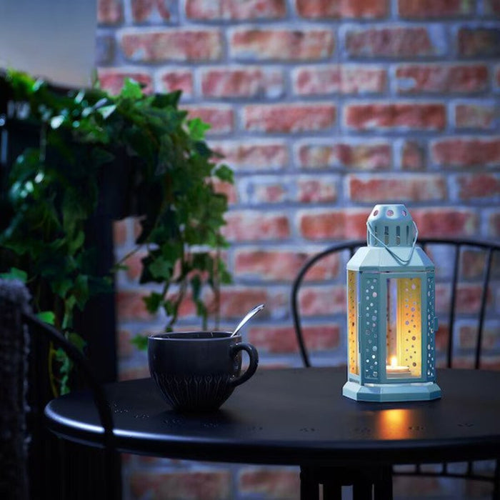A 22 cm (9 inch) lantern from IKEA in a soft pale blue color, made for both indoor and outdoor use and ideal for lighting tealights.-30542591