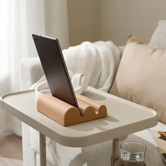 Eco-friendly IKEA FAGNING cork stand holding a tablet 00554142