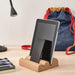 IKEA FAGNING cork mobile phone and tablet holder in use 00554142