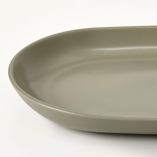  Close-up of IKEA FÄRGKLAR matt green serving plate showing even matte glaze surface and stoneware texture