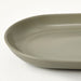  Close-up of IKEA FÄRGKLAR matt green serving plate showing even matte glaze surface and stoneware texture