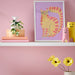 IKEA FEJKA kangaroo artificial plant styled on a desk in a home office setting