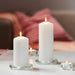 IKEA FENOMEN unscented pillar candle natural white close-up showing texture and wick detail