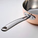 Close-up of the ergonomic handle on the FINMAT Saucepan for comfortable use.
