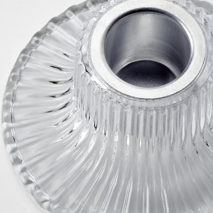 Close-up of IKEA FINSMAK clear glass candlestick showing glass and aluminium insert detail