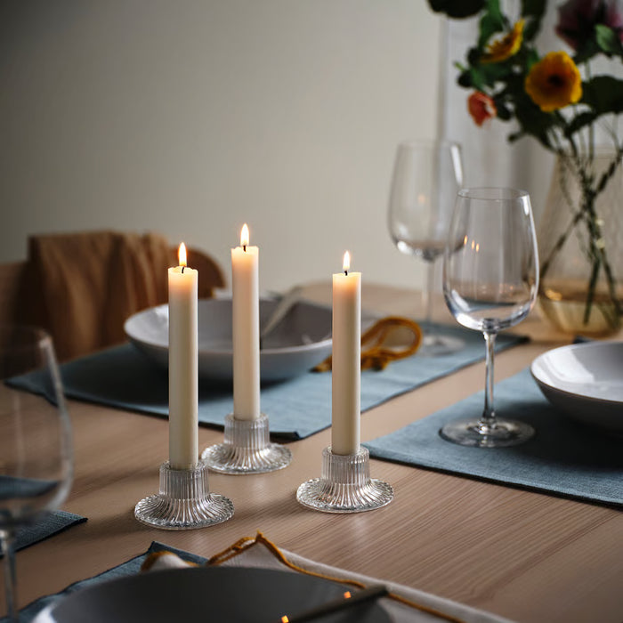  IKEA FINSMAK clear glass candlestick styled with lit candle on table