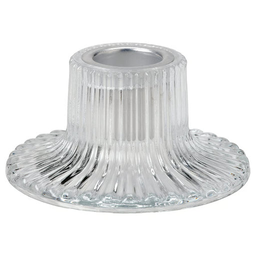 IKEA FINSMAK clear glass candlestick 4cm on plain background