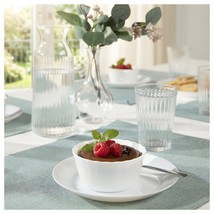 IKEA FISKTÄRNA white pie dish served on dining table with glassware and blue placemat