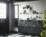  IKEA FJÄNTIG black chair hooks mounted in modern black and white entryway with grey storage units