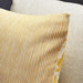 Close-up of IKEA FJUNKLOCKA cushion cover showing foliage and stripe reversible sides with visible stitching