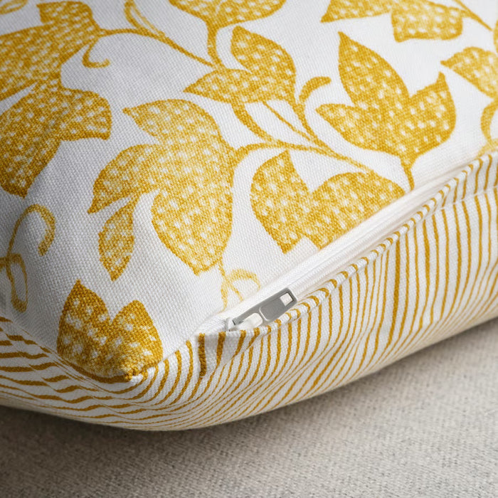 IKEA FJUNKLOCKA cushion cover yellow floral print close-up showing hidden zipper detail