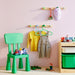 IKEA FLISAT knob rack mounted on wall with backpack hanging in child's bedroom