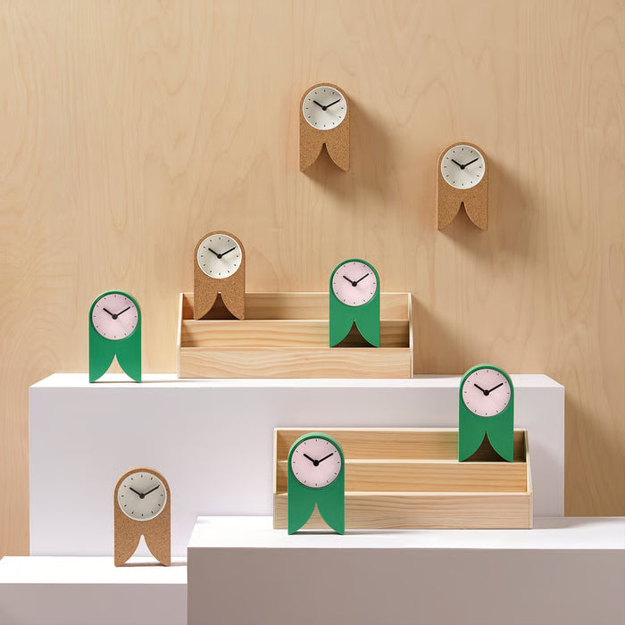 IKEA FLODKRÄFTA cork clock in natural and green variants displayed together in wooden tray