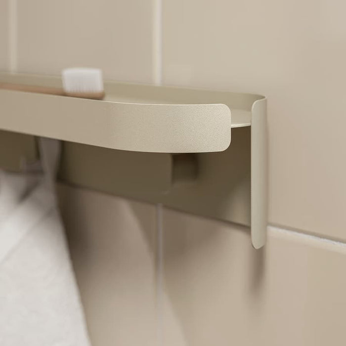 IKEA FLORSJÖN beige shelf close-up showing concealed fixings and curved edge detail