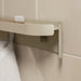 IKEA FLORSJÖN beige shelf close-up showing concealed fixings and curved edge detail
