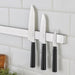 IKEA FÖRSLAG set of three knives — 17cm, 13cm, 8cm — mounted on a wall magnetic knife strip