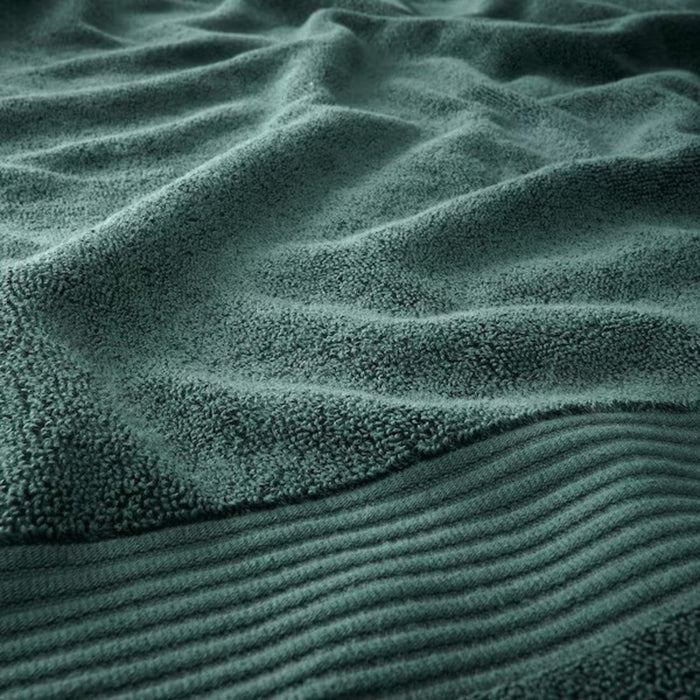 Close-up of IKEA Bath Towel fabric texture, showcasing its quality and comfort in a stylish soft hue