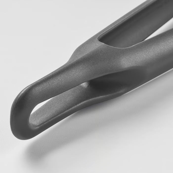 Close-up of IKEA FULLÄNDAD cooking tweezers grey handle with textured grip detail