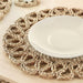 IKEA GALLSOPP round natural place mat under white bowl showing full diameter and weave detail