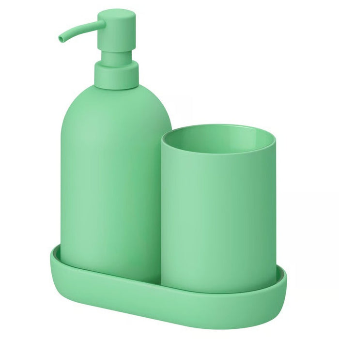 Green soap dispenser, cup, and tray set on a white background