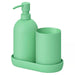 Green soap dispenser, cup, and tray set on a white background