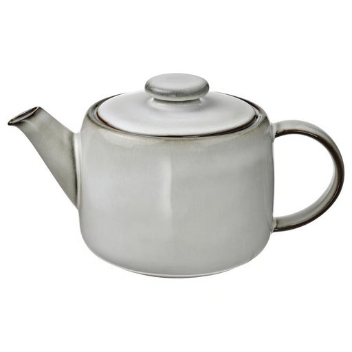 IKEA GLADELIG Teapot in matte grey stoneware with a handcrafted look, 1.2-liter capacity, ideal for serving tea with a modern, rustic aesthetic.

