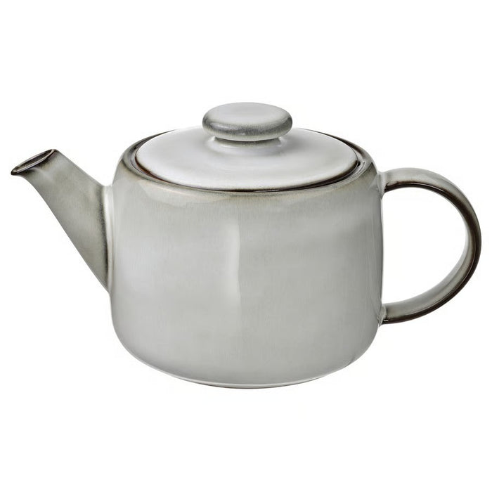 IKEA GLADELIG Teapot in matte grey stoneware with a handcrafted look, 1.2-liter capacity, ideal for serving tea with a modern, rustic aesthetic.

