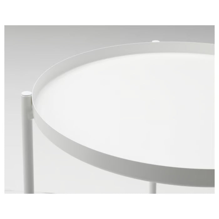 Close-up of IKEA GLADOM white tray showing powder-coated steel surface and raised edge detail